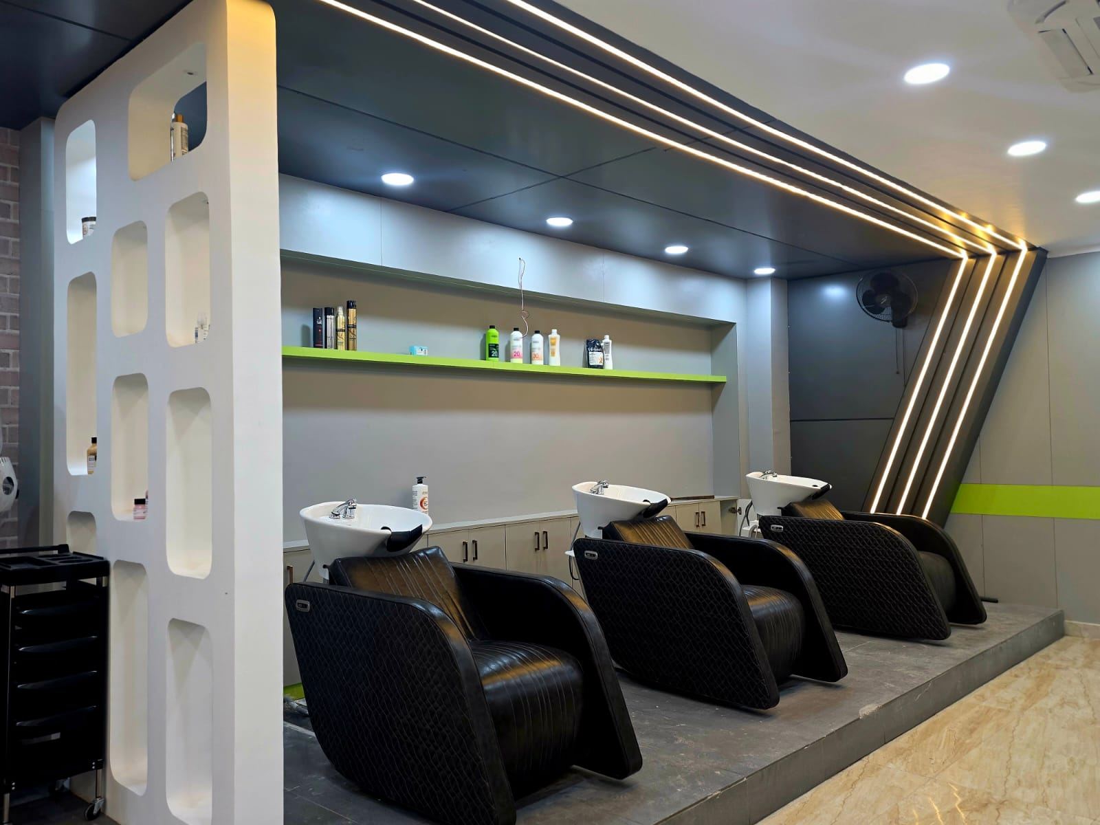 Orane Salon hair-wash area with three backwash chairs